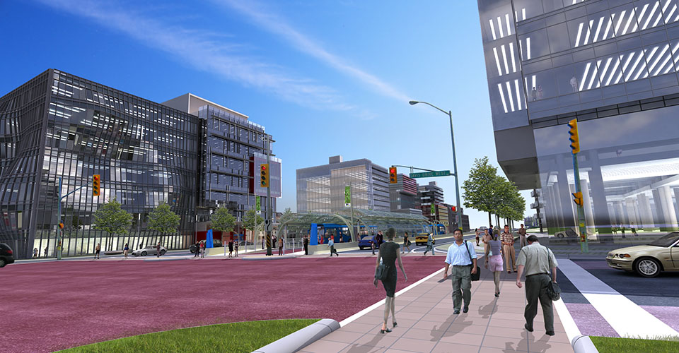 intersection with people crossing and public transit station in the background