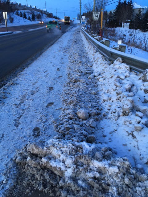 Sidewalk with snow coverings