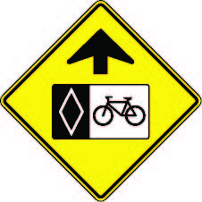 a graphic of a 'reserved bicycle lane ahead' sign