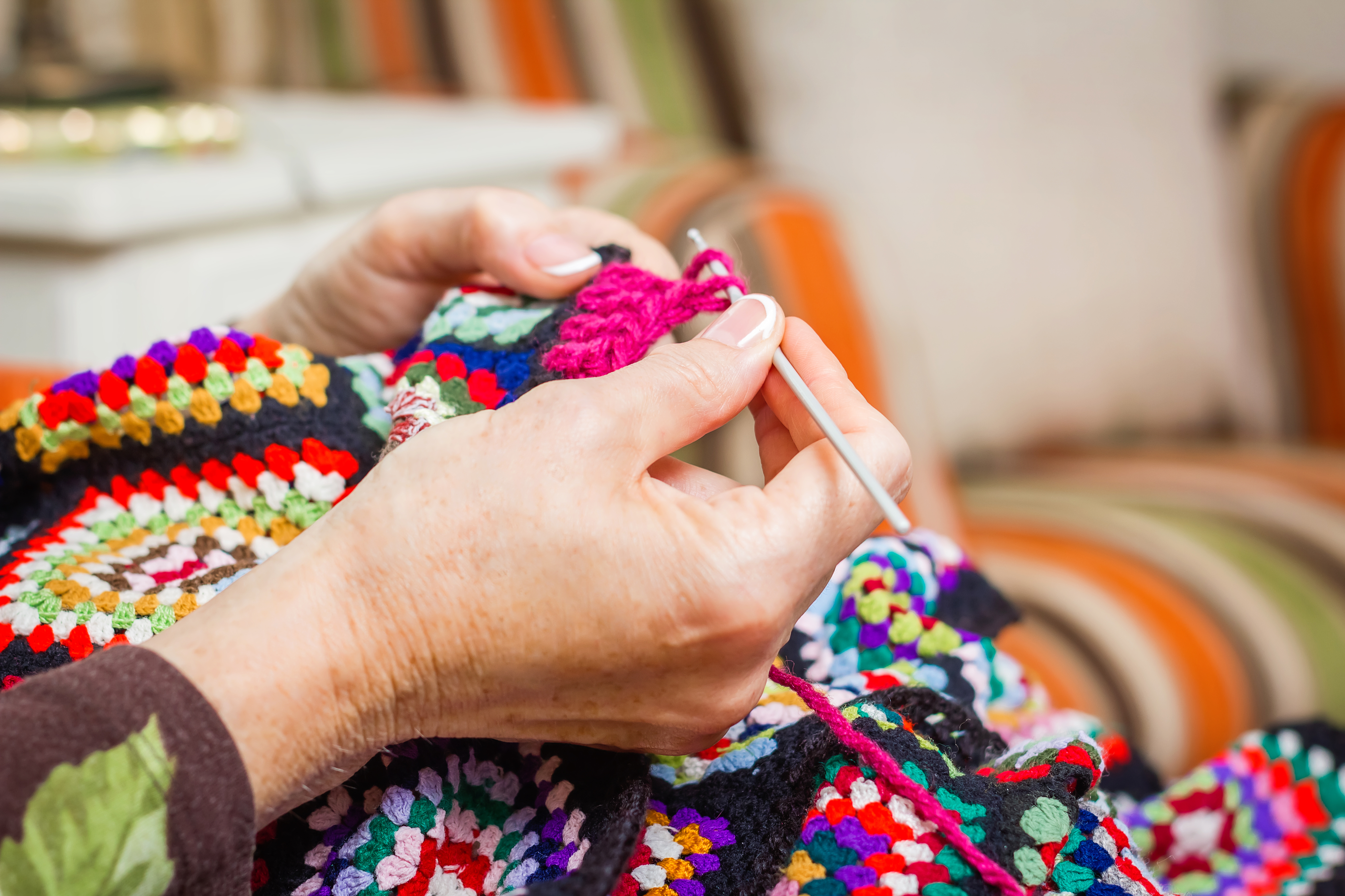photo of person knitting